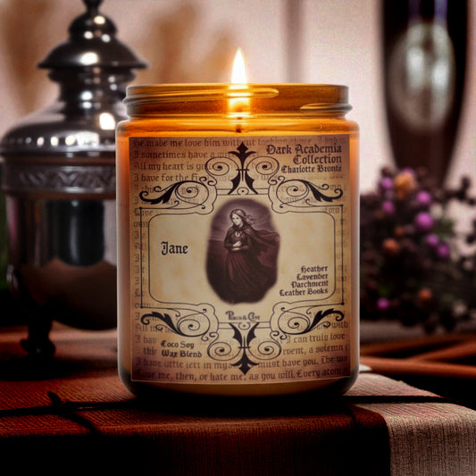 Jane Eyre Candle is inspired by Charlotte Bronte. Dark Academia fans, Gothic Literature candles. Jane Eyre candle smells like Heather, Dried Lavender, Leather-bound books, Parchment
